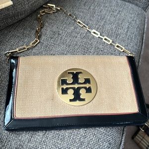 Tory burch clutch with a gold chain, used!